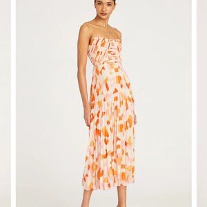 AMUR Strapless Pleated Midi Dress in Pink and Orange Geometric Print